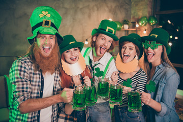 Poster - Funny funky costumes fake beard green eyewear specs beverage toasting tongue out of mouth company five members ginger red hair casual wearing white striped jeans checkered plaid shirts irish outfit