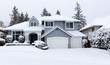 © tab62 - Snowing with residential Pacific Northwest home in background