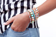 © 5second - Female hand with colorful bracelets