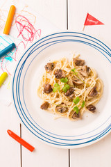 Wall Mural - Kid's meal (dinner) - spaghetti with mushrooms