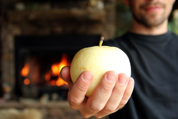 Wall Mural - Man holding pear