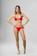 © Asier - Full body young woman posing wearing a bikini