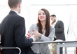 © ASDF - business woman shaking hands with a business partner.