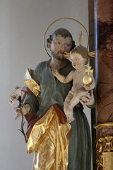 Saint Joseph holding baby Jesus, church of St. Clement in Primisweiler, Germany 