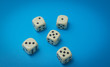 © bisonov - game dice abstract on a blue background