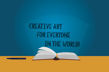 Handwriting Text Creative Art For Everyone In The World. Concept Meaning Spread Creativity To Others Color Pages Of Open Book Photo On Table With Pen And Light Beam Glaring