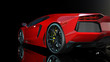 Red sports car, rear end and taillights of a sport automobile, race car isolated on black background, bottom view, 3D rendering