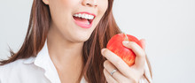 Portrait Beautiful Asian Woman Showing Perfect White Teeth And Bite Red Apple