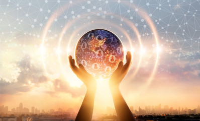 Leinwandbilder - Hands holding earth and wave circle global structure network connection and data exchanges customers worldwide on sunset background. Innovation and inspiration. Networking and technology concept