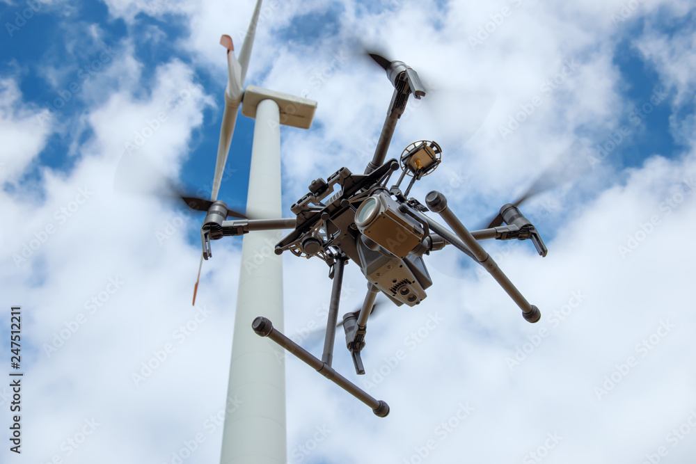 Industrial drone for inspection of rotor blades on wind turbines - obrazy, fototapety, plakaty 