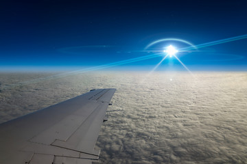 Poster - UFO flies near airplane in dark blue sky