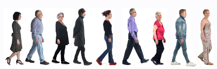 group of mixed people walking on white