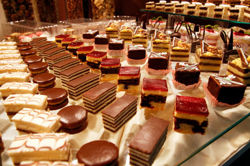 Colorful desserts and pastry served on a wedding party