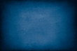 © NatasaAdzic - Dark Blue Blackboard. Messy scratchy chalkboard texture as background.