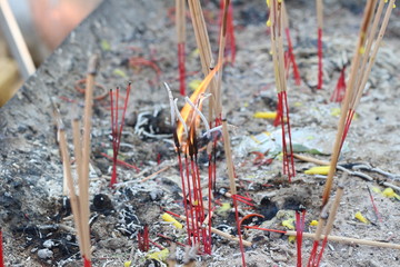 Incense candles at the point of worship.