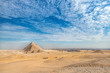 incredible view of the complex of ancient pyramids against the background of the incredible sky on a hot day in the desert