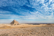 incredible view of the complex of ancient pyramids against the background of the incredible sky on a hot day in the desert