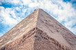 .Elegant view of the top of the pyramid of the cheops on a sunny day in the desert