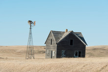 An Old Farmhouse On The Prairie In North Dakota