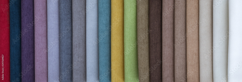Colorful upholstery fabric samples in store - obrazy, fototapety, plakaty 