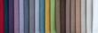 © serikbaib - Colorful upholstery fabric samples in store