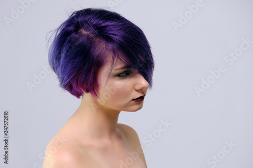 A Beautiful Sexy Girl With Purple Hair And A Short Haircut