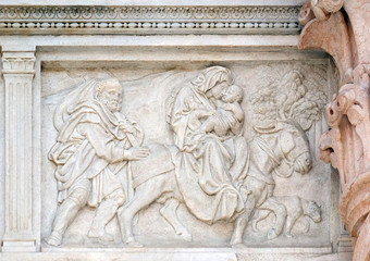 Wall Mural - Flight to Egypt, relief on portal of Saint Petronius Basilica in Bologna, Italy