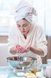 © Artem - Beautiful young woman washing and refreshing face with water in the morning. Hygiene and care for the skin at home