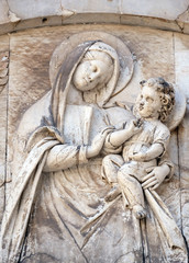 Wall Mural - Virgin Mary with baby Jesus, Cathedral of S.Martino in Lucca, Italy