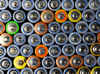 Salt and alkaline batteries, source of energy for portable technology. AAA and AA batteries