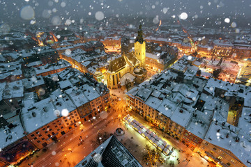 Lviv in winter time. Picturesque evening view on city center from top of town hall. Eastern Europe, Ukraine