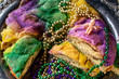 canvas print picture - king cake with baby surrounded by mardi gras beads