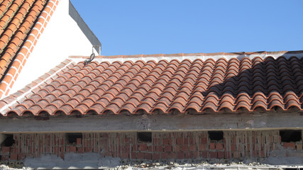 Winter sun shining on newly refurbished roof in Andalusian village