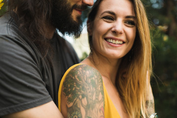 Sweet couple hugging in the summertime