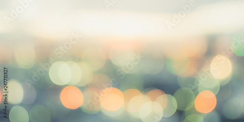 Cuadros en Lienzo Golden hour sky with city rooftop view blur background with cityscape business c