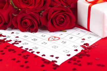 February 14 on calendar and decorations for Valentine's Day.