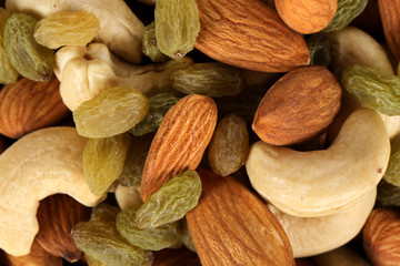 Wall Mural - ssorted nuts on white, dry fruits, mix nuts, almond, cashew,  raisin