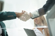 © yurolaitsalbert - bottom view.closeup of a business handshake partners