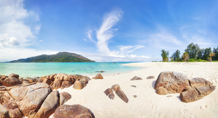 Canvas Print - Empty sunny Koh Lipe Bulow Beach with rocks on foreground