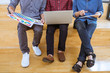 © Ngampol - Teamwork of creative designers working on new project and choose color swatch samples for selection coloring on digital graphic tablet with work tools and equipment at workplace