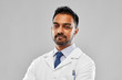 © Syda Productions - medicine, science and profession concept - indian male doctor or scientist in white coat over grey background