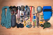 © Alexeiy - .climbing equipment on a wooden background before travel