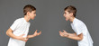 © Prostock-studio - Twin brothers having quarrel with each other over studio background