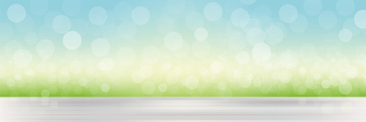 Abstract vector spring or summer defocused banner with dots of light. Natural background with blurred grass and sky and bokeh effect, mockup for advertising organic cosmetics or natural products, food