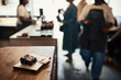 © mavoimages - Delicious chocolate brownie ready for serving on a cafe counter