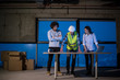 © .shock - business people in group, architect and engineer on construction site