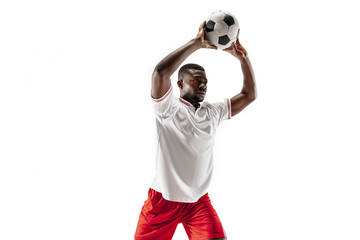 Wall Mural - Professional african american football soccer player in motion isolated on white studio background. Fit jumping man in action, jump, movement at game.