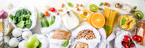 Plakaty do kuchni zero-waste-shopping-and-sustanable-lifestyle-concept-various-farm-organic-vegetables-grains-pasta-eggs-and-fruits-in-reusable-packaging-supermarket-bags-copy-space-top-view-banner