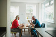 © dglimages - Mature Couple Enjoying Breakfast at Home