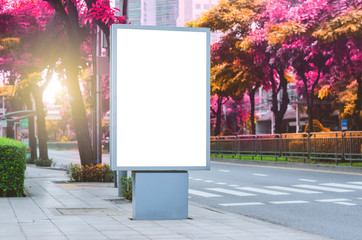 Wall Mural - blank billboard white led screen vertical outstanding in city on pathway side the road traffic for d